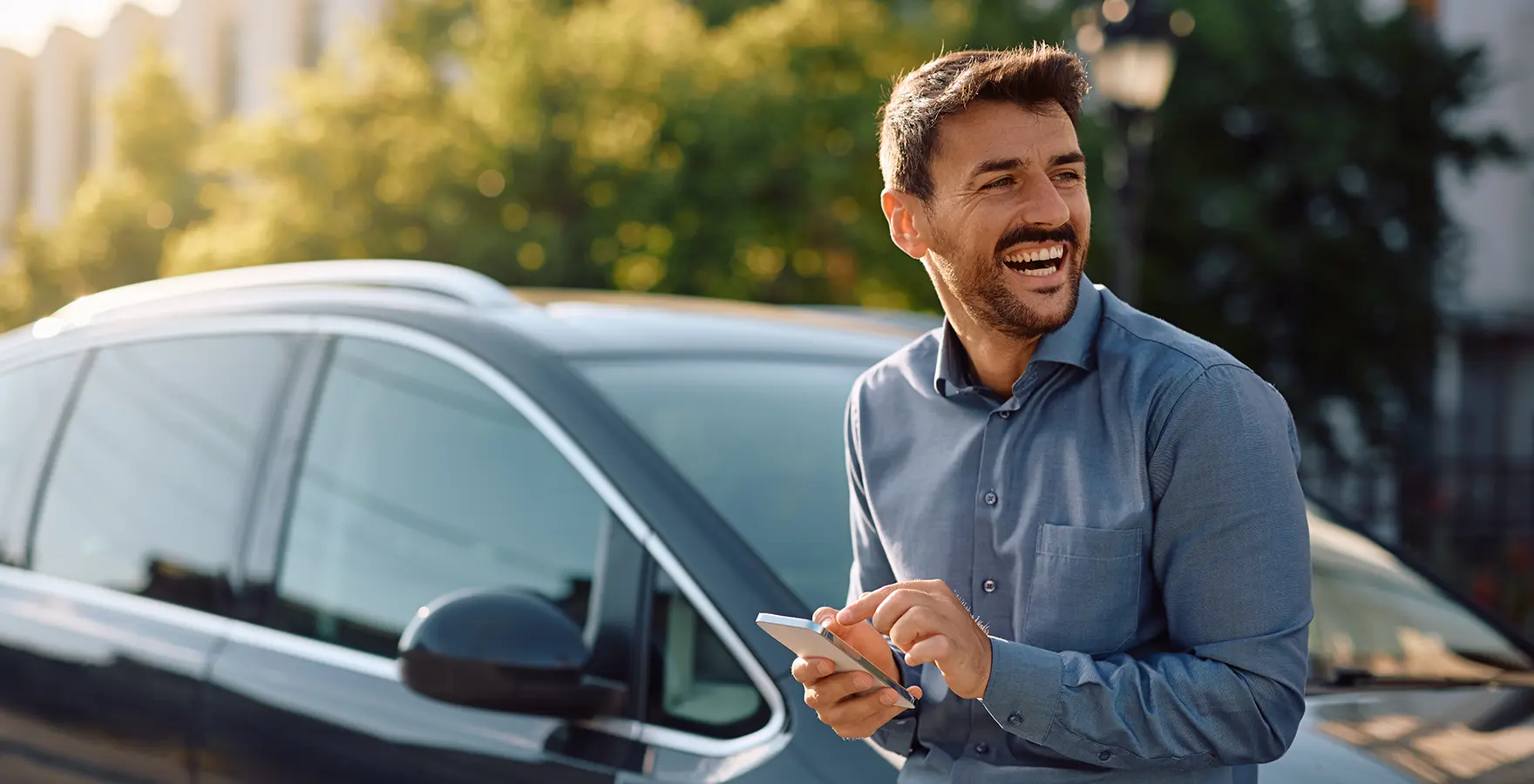 Man leaning on car