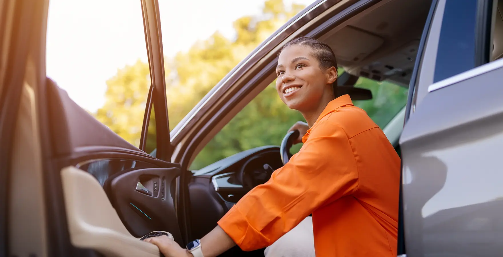Woman exiting car