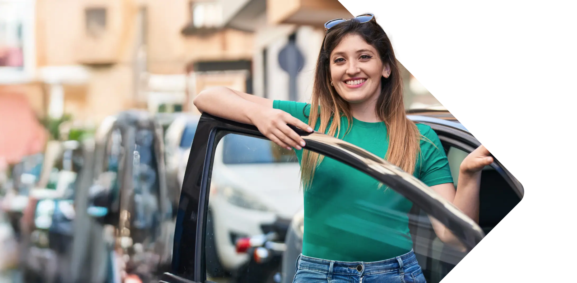 Woman standing by a car