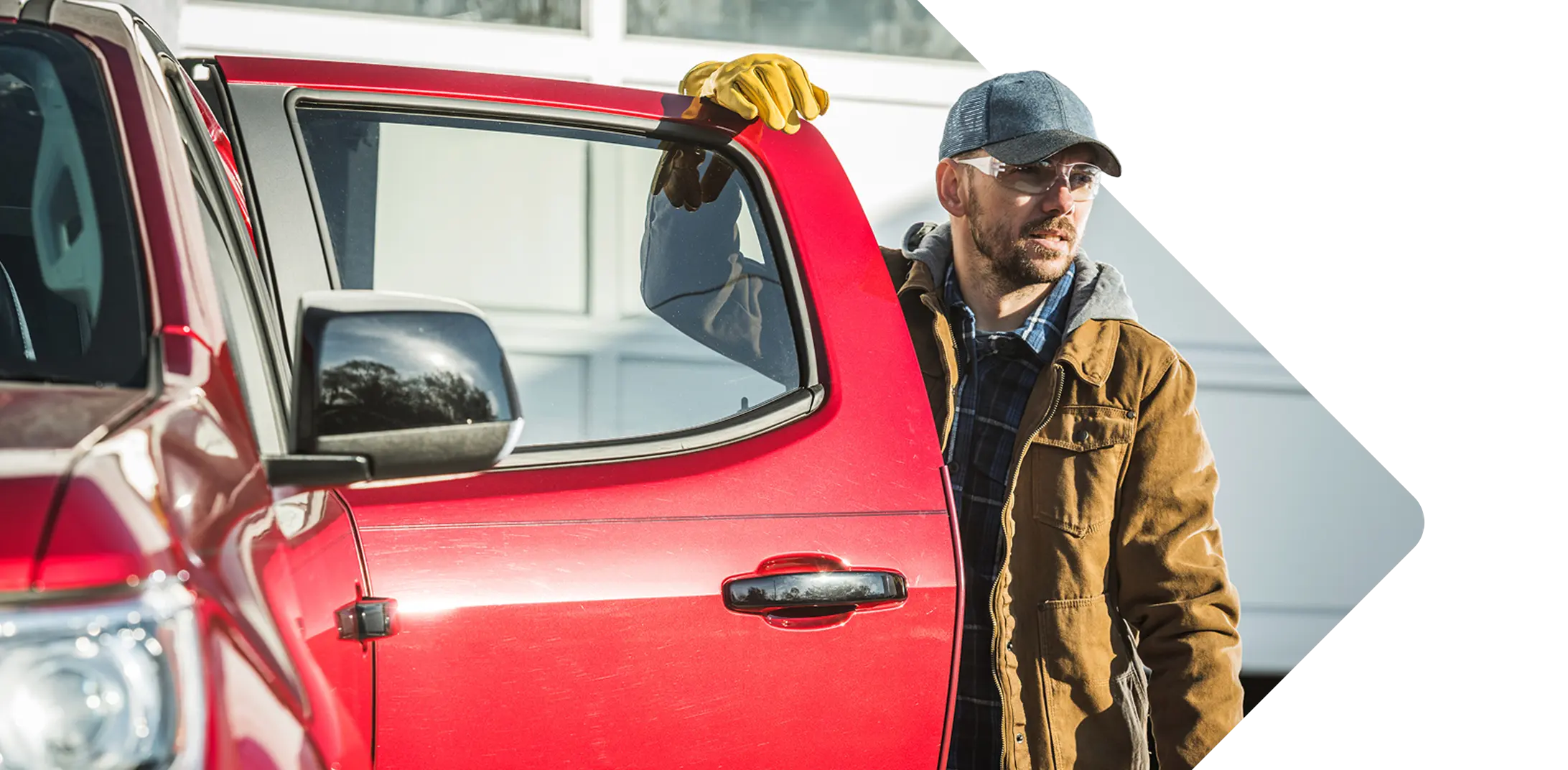 Man standing by a truck