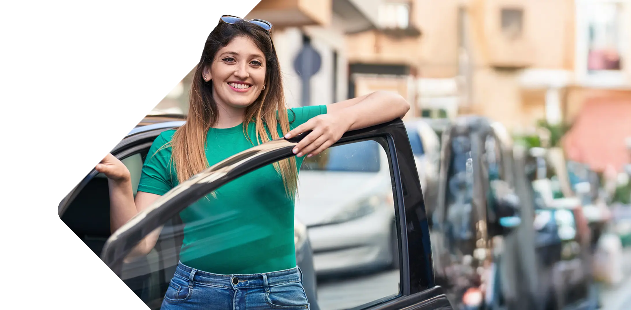 Woman standing by a car