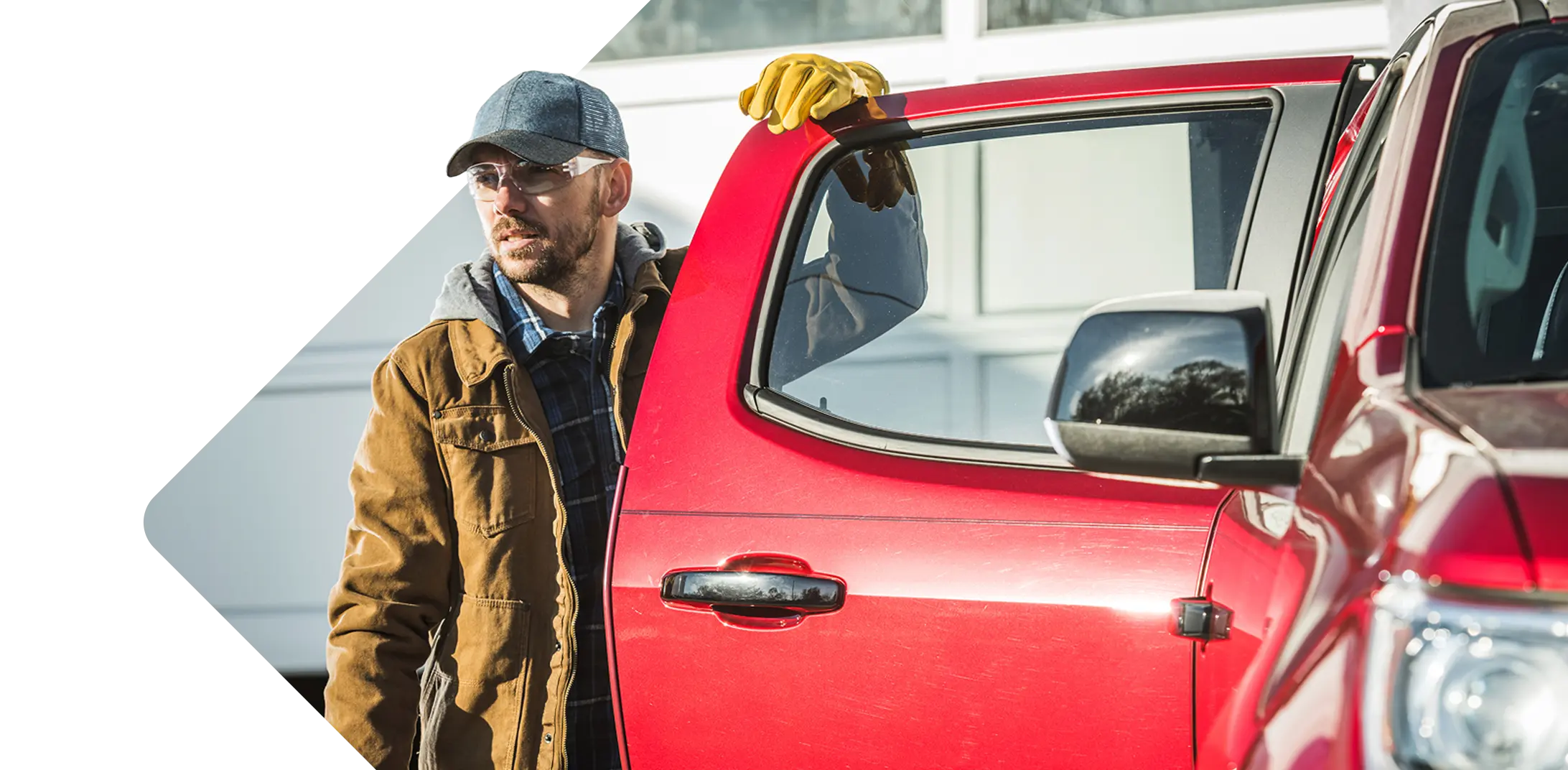 Man standing by a truck