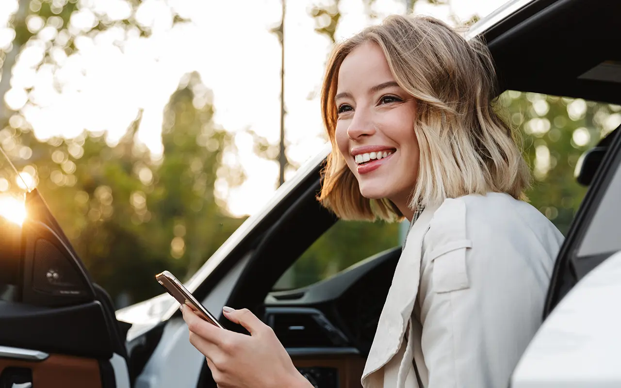 Woman exiting car